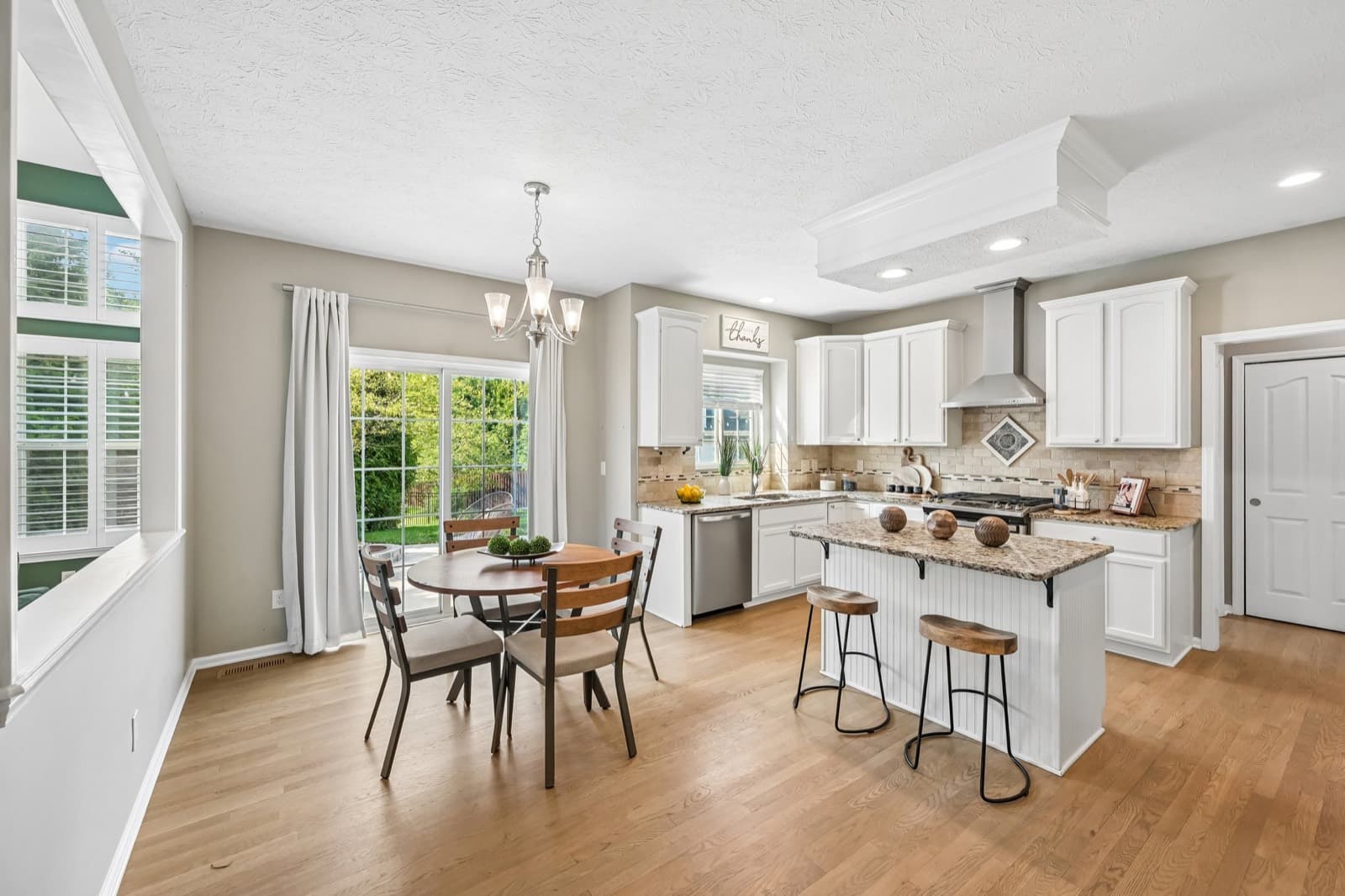 Bright breakfast room off the kitchen