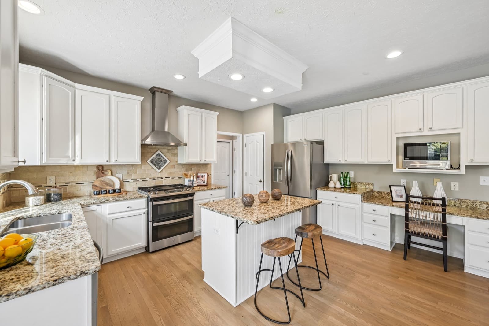 Kitchen with granite countertops and center island
