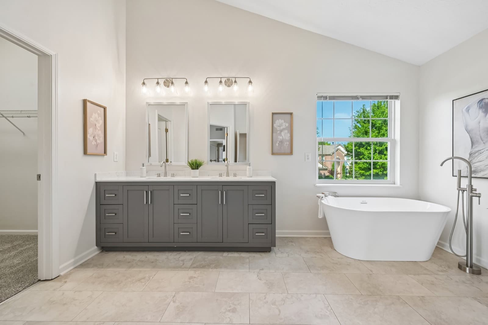 Remodeled spa-inspired primary bath with soaking tub