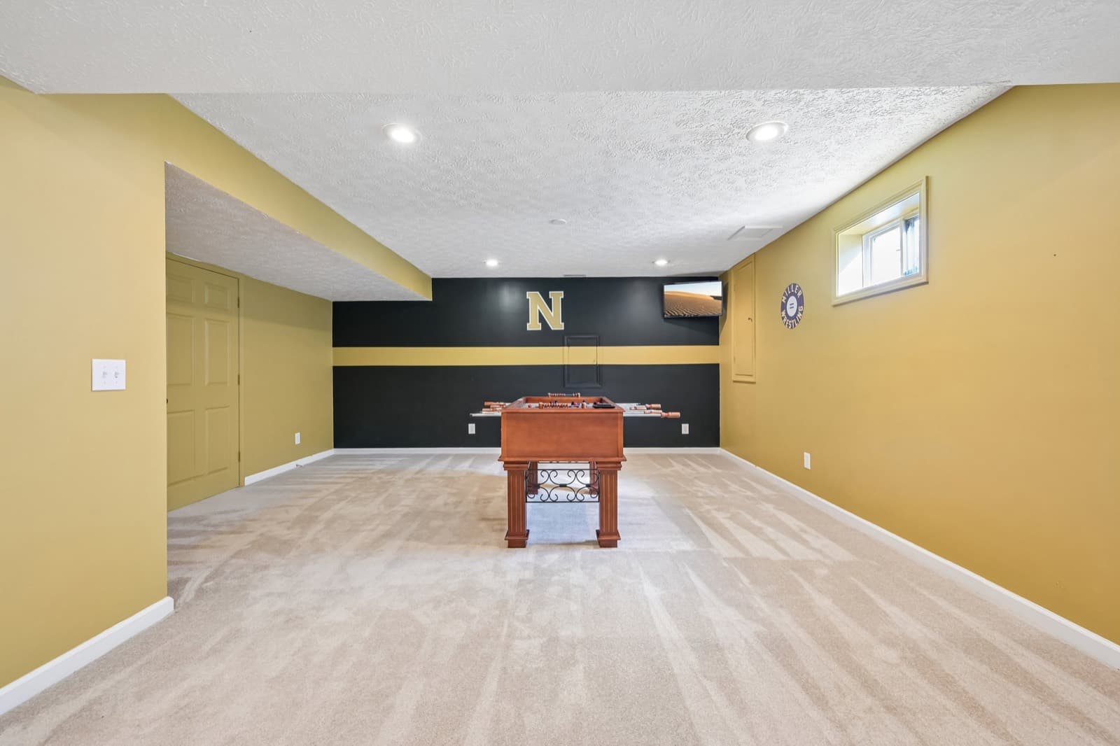 Versatile basement recreation space