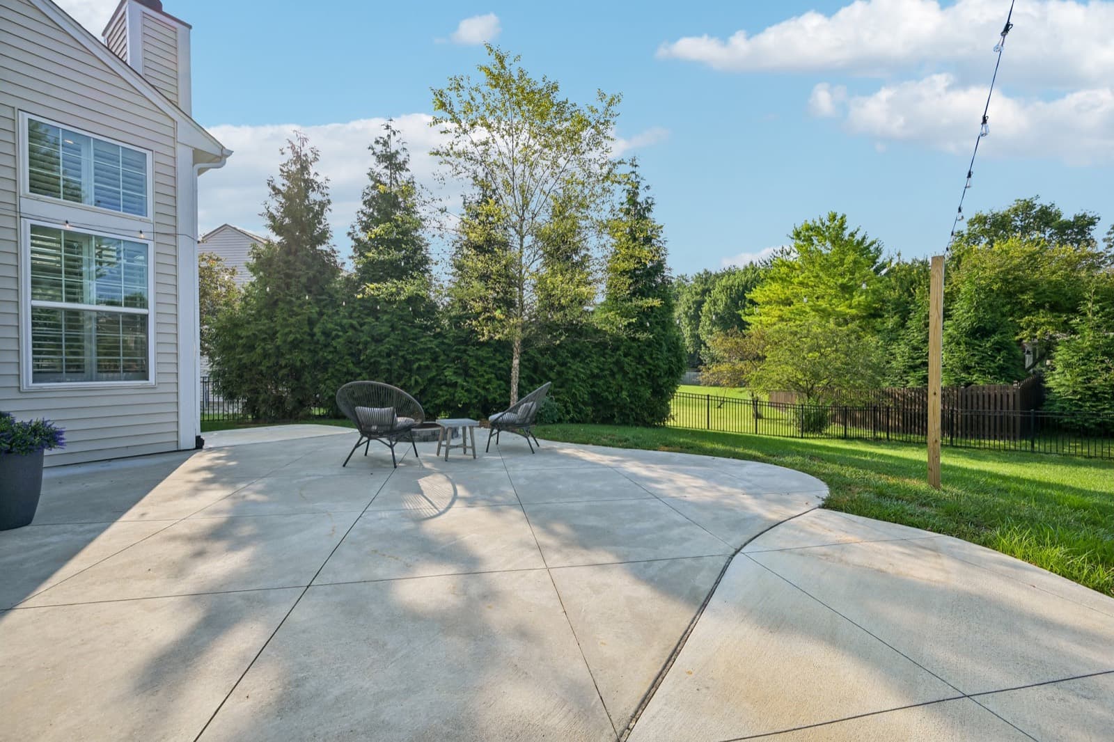 Backyard patio with built-in fire pit